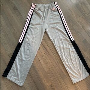 Adidas women’s track pants with Pink and Black Stripes